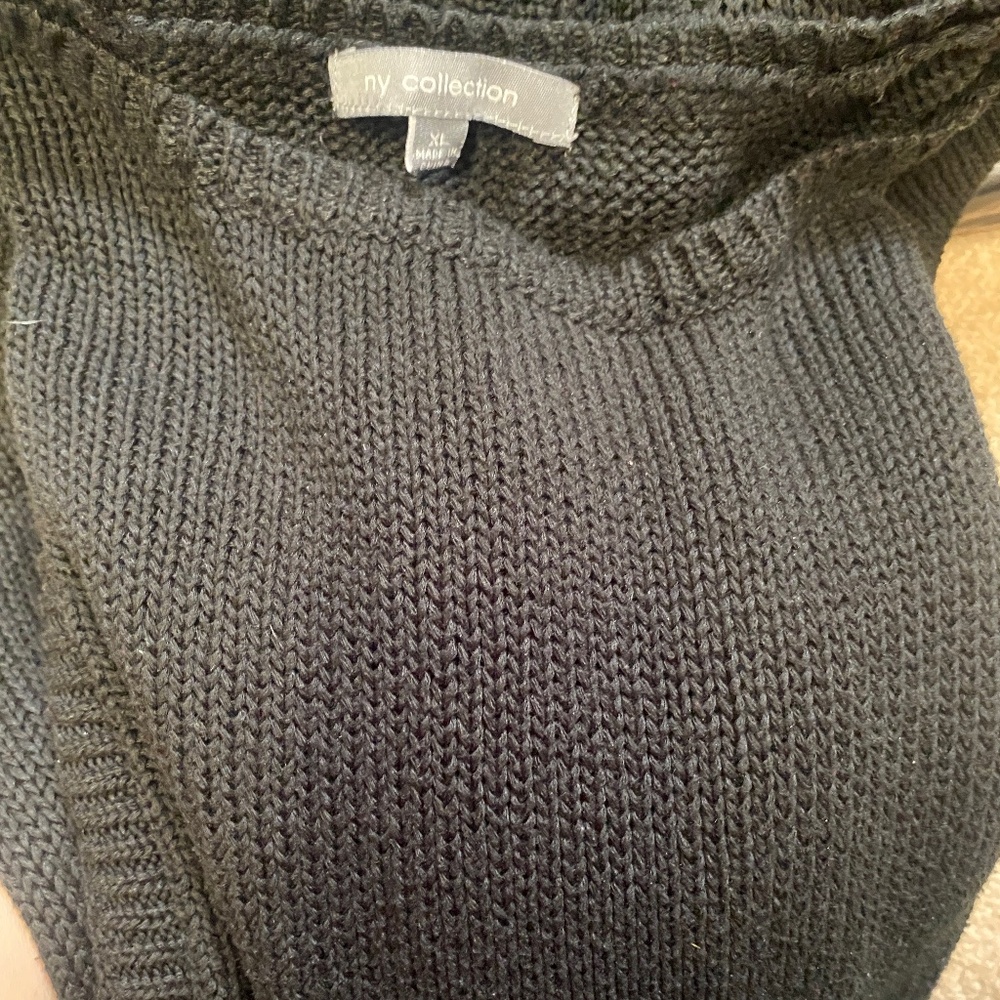 Womans long black sweater